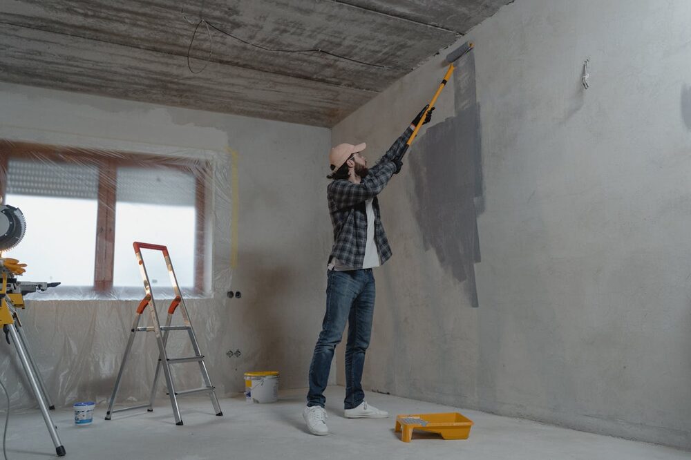Z&A decorator preparing a wall